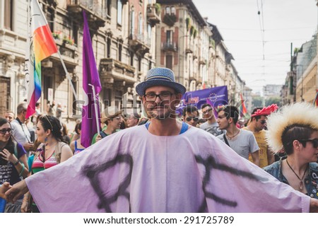 MILAN, ITALY - JUNE 27: People at gay pride parade in Milan JUNE 27, 2015. Thousands of people march in the city streets for the annual gay pride parade, claiming equality and legal rights.