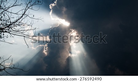Light of sun trough rain clouds