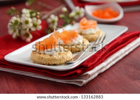 Canapes with oat bran cookies, smoked salmon and cream cheese