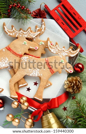 Christmas gingerbread cookies with christmas decoration. Elk shapes.