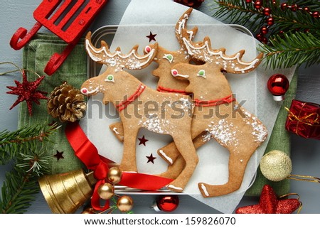 Homemade christmas cookies with christmas decoration. Elk shapes.
