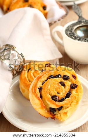 Fresh gluten free sweet swirl buns with raisins for breakfast
