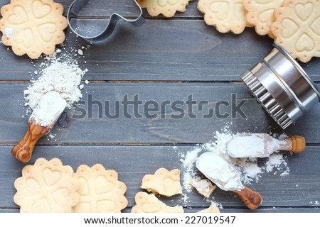 Background of baking gluten free shortbread cookies with utensils and ingredients,  viewed from above
