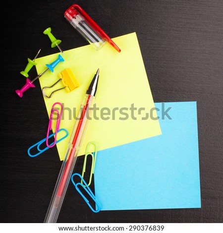 School education background with yellow and blue sticky notes, with copy space. Back to school concept. Top view.