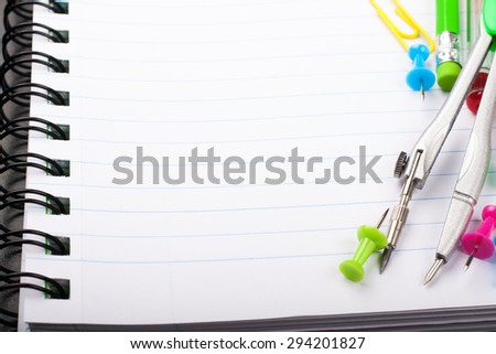 School education background with blank exercise book with copy space. Back to school concept.  Selective focus.