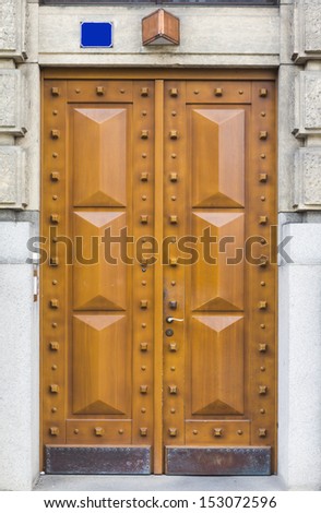 entrance wooden door with panels