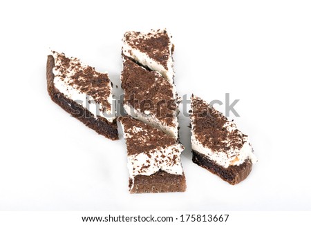 slices of cake with chocolate on a white background