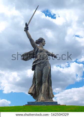 RUSSIA - JULY 02: 'The Motherland calls!' monument on July 02, 2012, Volgograd, Russia. TThe memorial was constructed in 1967, and is crowned by a huge allegorical statue of the Motherland