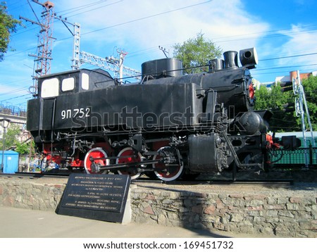 PERM, RUSSIA - JULY 08, 2012: Monument to Soviet locomotive. This locomotive is one of the oldest locomotives in Russia