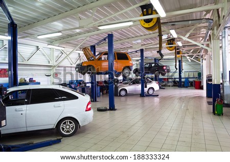 NIZHNY TAGIL. RUSSIA - JUNE 12, 2013: Cars for repair service station. Auto Service is the official dealer of Auto VAZ