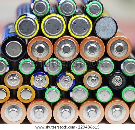 Heap of alkaline batteries close up