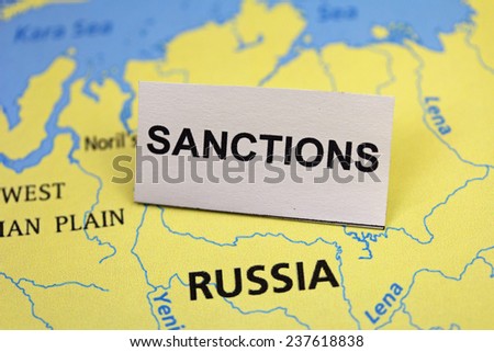 Russian map with sanctions sign close up