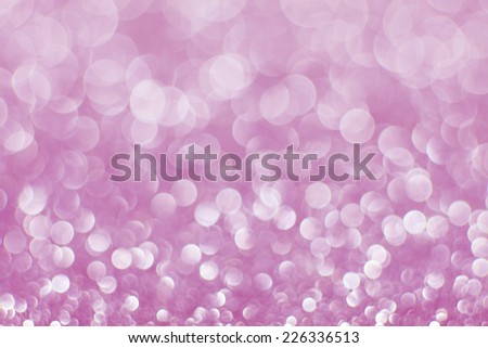 Pink sugar sparkle background with focus in the front