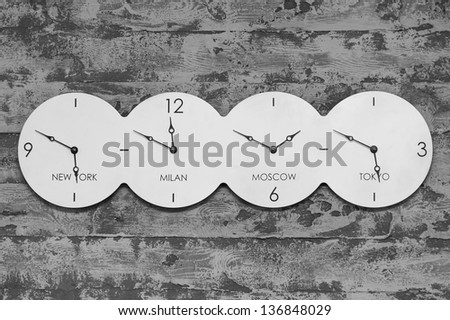 Office Clock with world on black and white background