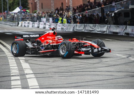 MOSCOW, RUSSIA - JULY 21: Professional Formula 1 Marussia driver Max Chilton in Moscow City Racing Circle, Moscow on 21 July 2013