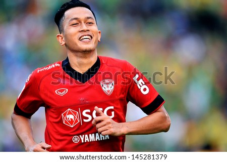 BANGKOK,THAILAND-JULY 6:Piyapol Bantao of MTUTD run celebrates after scoring during the Thai Premier League between Maungthong United and Army United at Army stadium on Jul6,2013 in Bangkok,Thailand.