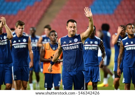 BANGKOK,THAILAND- JULY 16: John Terry and team-mate of Chelsea FC during a Chelsea FC training session at Rajamangala Stadium on July 16, 2013 in Bangkok, Thailand.