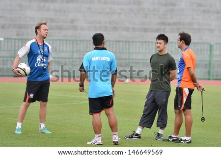 BANGKOK,THAILAND- JUNE 24: Mano Polking (L) head coach and staff coach of Army United during a training session at Army stadium on June 26,2013; Bangkok,Thailand