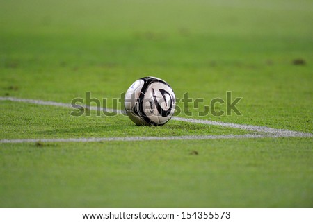 BANGKOK,THAILAND-SEP 14:The ball on the grass during football Thai Premier League 2013 between Muangthong United and TOTSC at SCG stadium on Sep 14,2013 in Thailand.