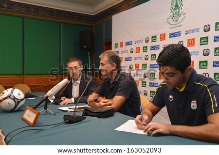 BKK,THA-NOV 14,2013:Carlos Quieroz(C) head coach of Iran in press conference during AFC Asisan Cup 2015 Qualifiers between Thailand and Iran at Nation stadium on November 15,2013 in Bangkok, Thailand.