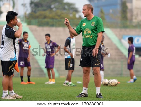 BANGKOK - JANUARY 6: Matt Elliott (green) head coach of Army United and former Leicester City footballer in action during the training session at Army Stadium on January 6, 2014 in Bangkok, Thailand.