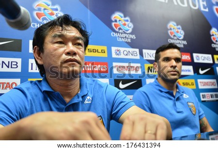 NONTHABURI-FEB7,2014:Phan Thanh Hung (L) head coach of Hanoi T&T in action during press conference AFC Champions League 2014 between MTUTD and Hanoi  at Chonburi Stadium on February7,2014 in Thailand