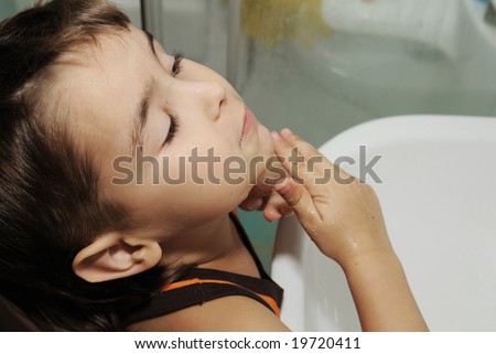 Boy Washing Face