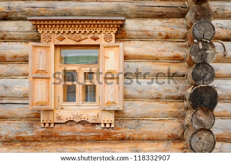 Window in an wooden peasant house of Russian North
