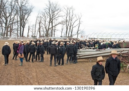 GEORGETOWN, PA-MARCH 2:  Amish men socializing prior to the auction at the annual Mud Sale on March 2, 2013 in Georgetown, PA.  The sale attracts thousands of people looking for bargains.