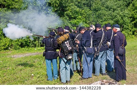 COLUMBIA, PA-JUNE 29: Union soldiers shooting a volley at the Civil War encampment at Columbia on June 29, 2013.  Columbia celebrated the 150th anniversary of its role in the Civil War.
