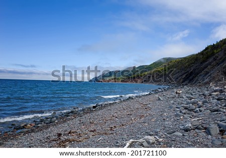 Cape Breton Highlands National Park provides many scenic views.  Cape Breton Island, part of the province of Nova Scotia, Canada is composed of rocky shores, farmland, glacial valleys, and mountains.