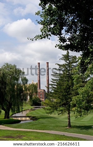 HERSHEY, PA, USA-SEPTEMBER 10, 2014: Hershey Company smoke stacks stand alone as the company removes a large segment of the original chocolate factory built by founder Milton Hershey.