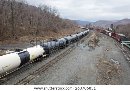 MARYSVILLE, PA, USA-MARCH 15, 2015:  Oil train loaded with Bakken crude oil headed for refineries near Philadelphia PA.  There is concern regarding the potential danger of oil trains.