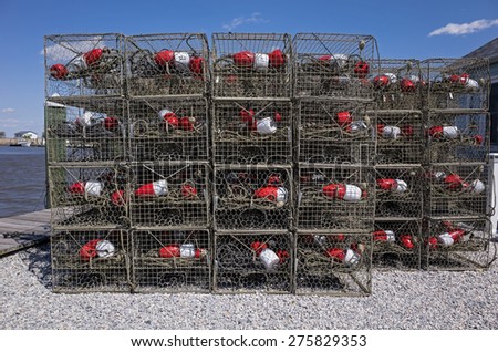Crab traps sitting on the dock waiting for the opening of the blue crab season.  Steamed blue crabs are a popular dish along the eastern seaboard.