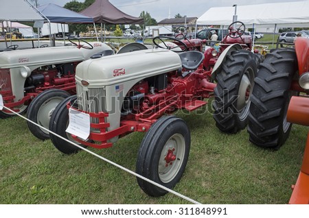 ELIZABETHTOWN, PA, USA-AUGUST 24, 2015:  1950 Ford farm tractor on display at the local country fair. Many vintage farm tractors and implements graced the fairgrounds.