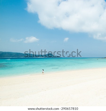 Tropical beach paradise with white sand beach and beautiful blue coral waters in Kagoshima, Japan