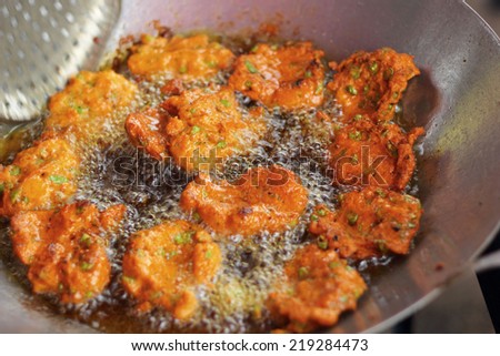Fried fish patty in the pan