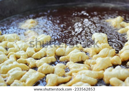 Deep-fried dough stick on the pan