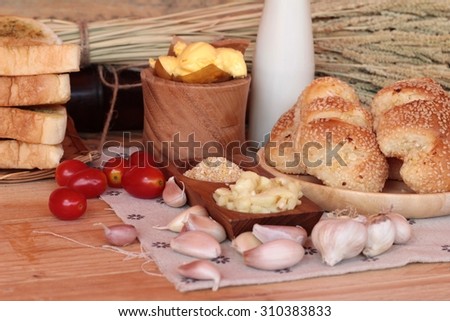 Garlic bread of herb delicious on wood background