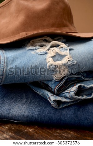 Fashion Torn Jeans and Leather Hat