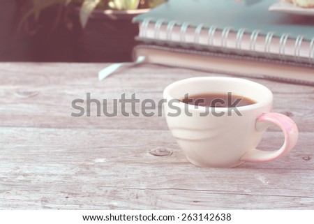 coffee cup on table with cake : vintage style