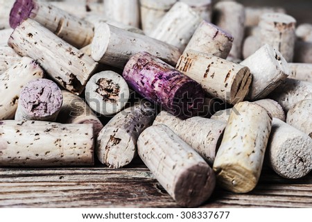 Close-up of wine corks on a wooden background in the horizontal format