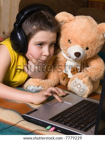 Young girl plays computer games