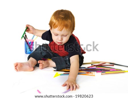 stock photo : Funny kid with color pencils