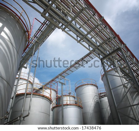 chemical plant and storage tanks, sunny day