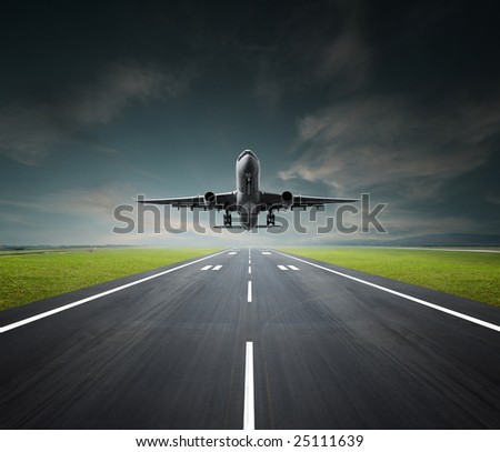 aeroplane departing or landing at the airport