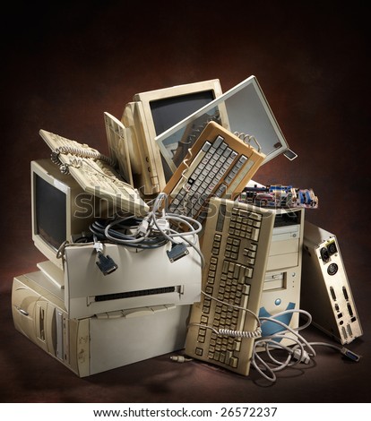 stack of old and obsolete computer equipment