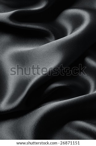 smooth black satin with curve and ripple