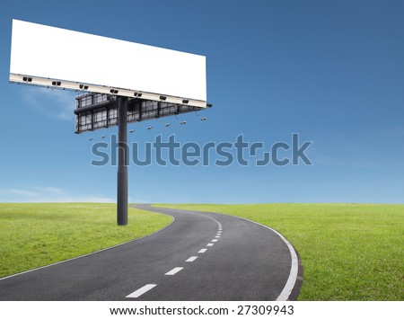 blank billboard at roadside of a curve road