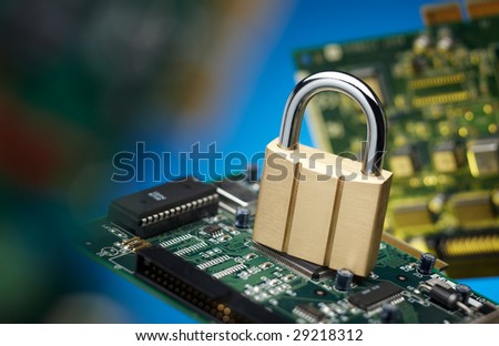 padlock and printed circuit board, network security concept